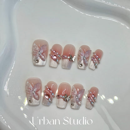 Pink Butterfly press-on nails in square shape, medium length