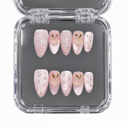 Peach Dew medium almond pink press-on nails with 3D peach charms and dew drops
