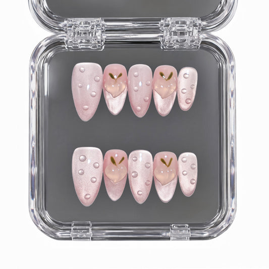 Peach Dew medium almond pink press-on nails with 3D peach charms and dew drops