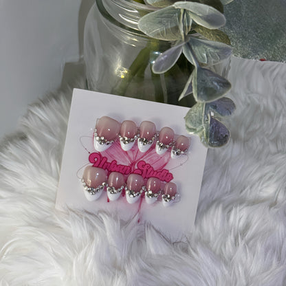 Crystal Crown press-on nails in almond shape, medium length