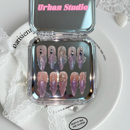 Lavender Drip press-on nails in stiletto shape, medium length