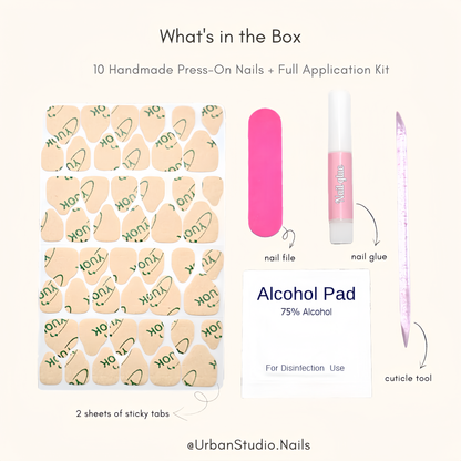What's in the box: 10 handmade press-on nails, nail glue, 2 sheets of sticky tabs, nail file, cuticle tool and alcohol pad